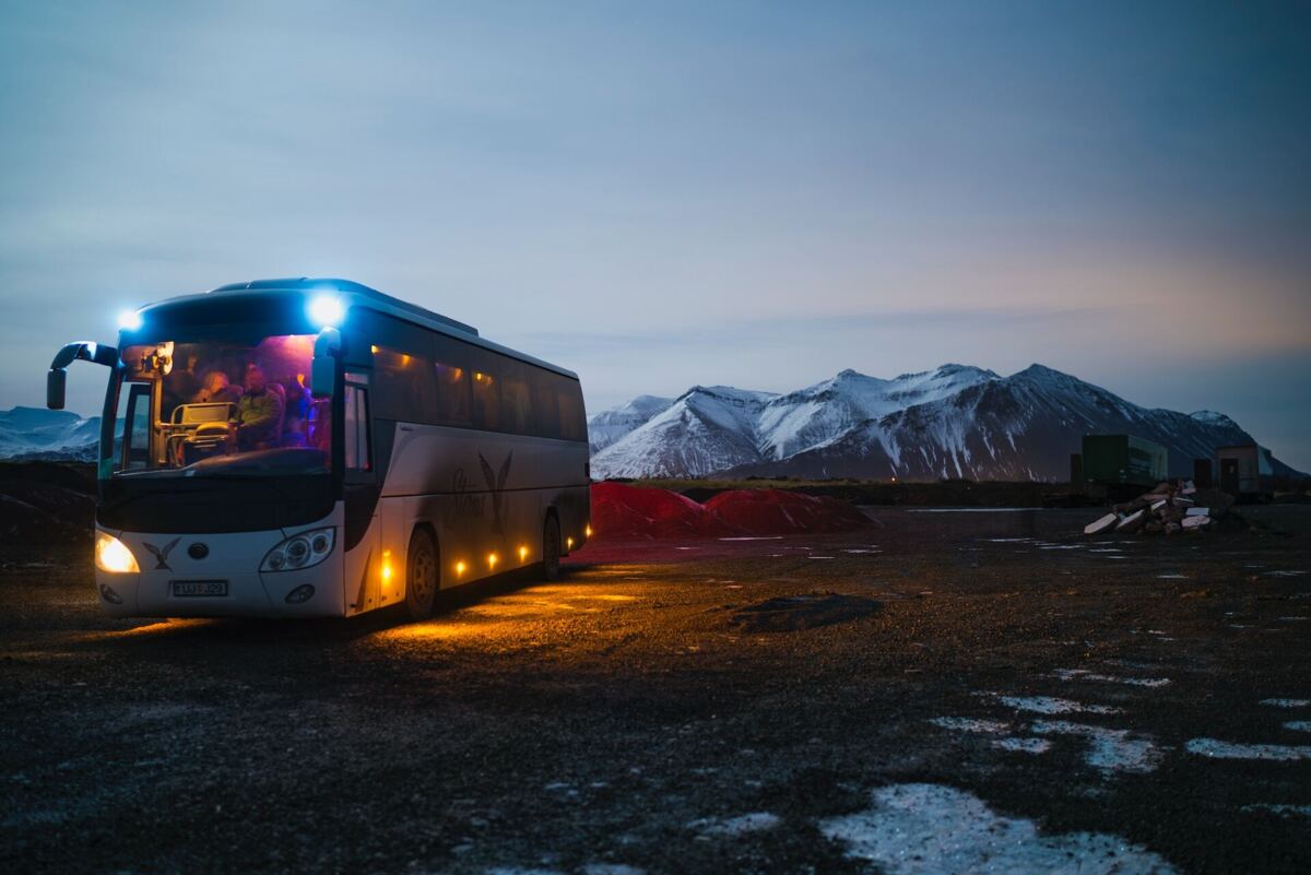 luxury coach in a mountain landscape